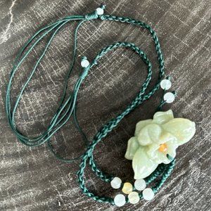 Embrace the beauty of nature with this earthy Jade necklace